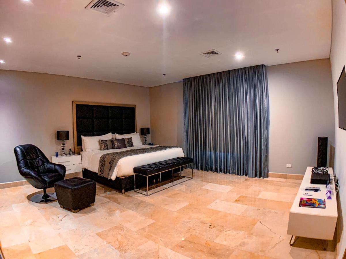 Hotel Dann Carlton Barranquilla Y Centro De Convenciones Екстериор снимка A bedroom at the hotel